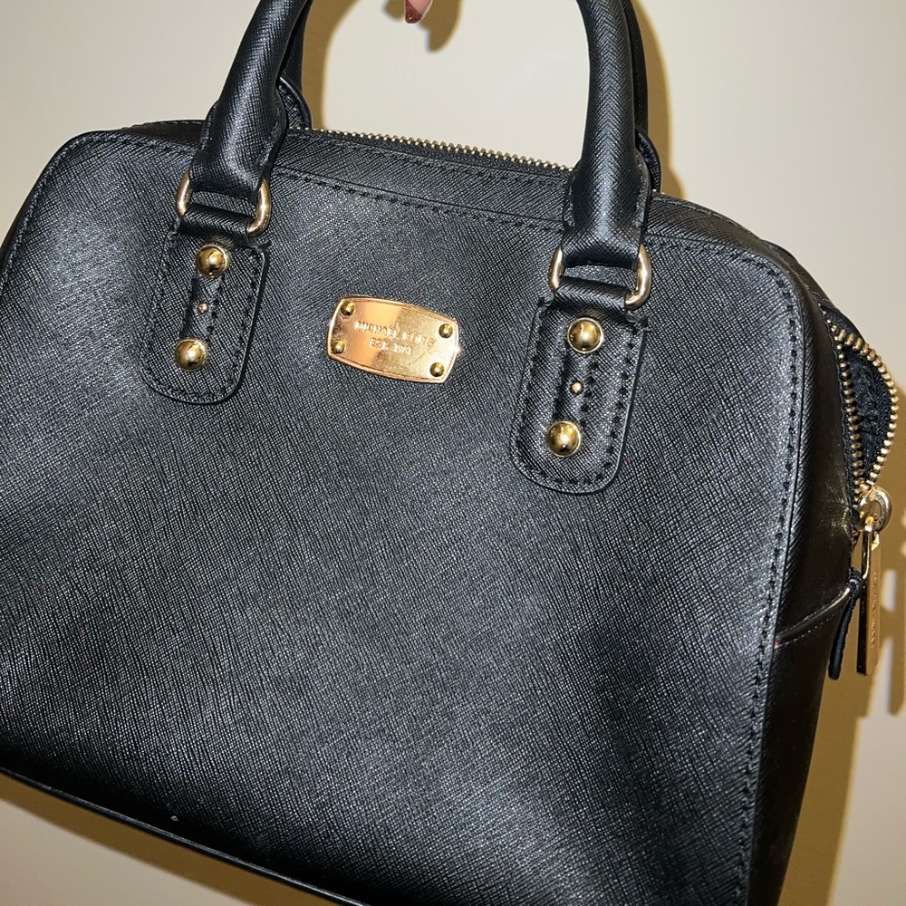 Black Michael Kors Top Handle handbag.